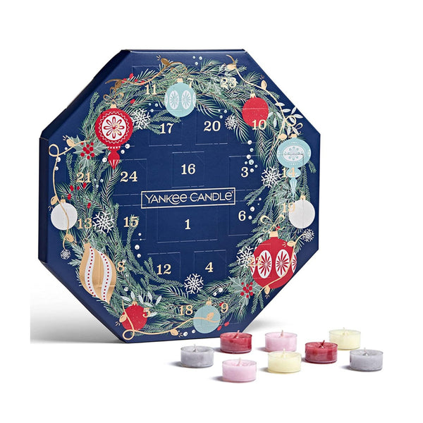 Front view of the 2021 Yankee Candle Advent Calendar Wreath, a festive holiday decoration.