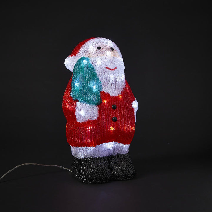 Acrylic Santa Claus Christmas decorations with LED lights.