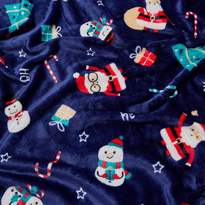 Holiday-themed blue fleece throw, 50x60in, made entirely from recycled plastic bottles. Cozy and eco-friendly.