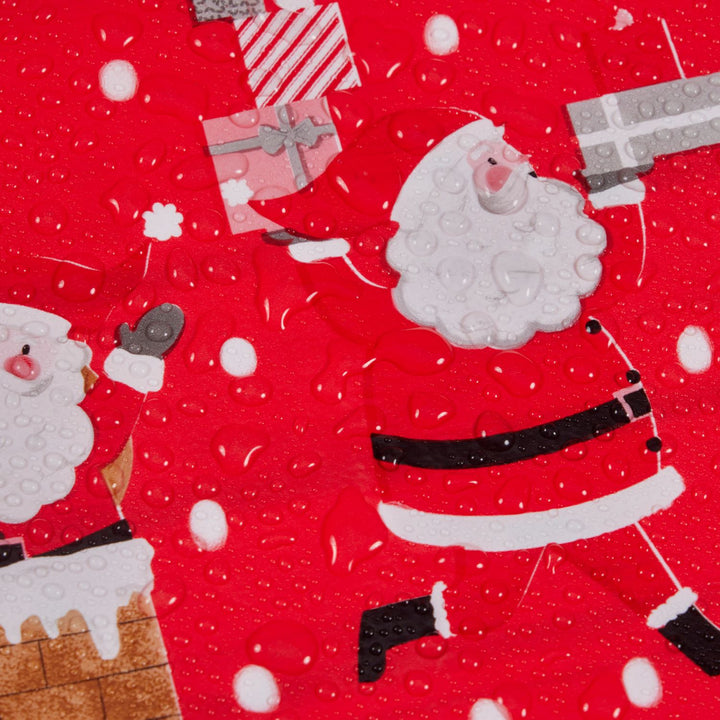 Detailed view of the delightful Christmas-themed Santa patterns on the PVC tablecloths.