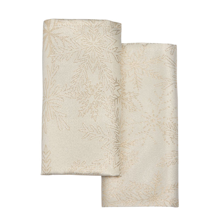 Set of 6 cream and gold snowflake napkins, perfect for special occasions and gatherings.