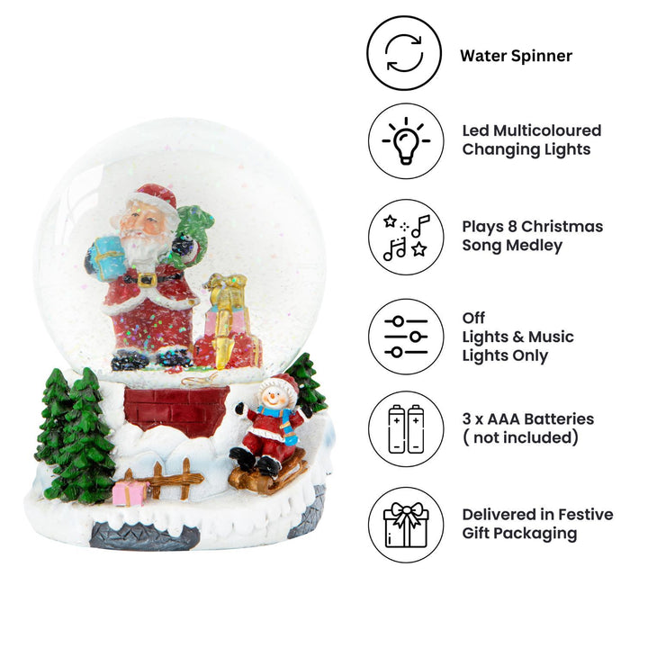 A delightful Christmas snowglobe with a mesmerizing water spinner and battery-powered LED lights, featuring Santa and a child sledging in a snowy wonderland.