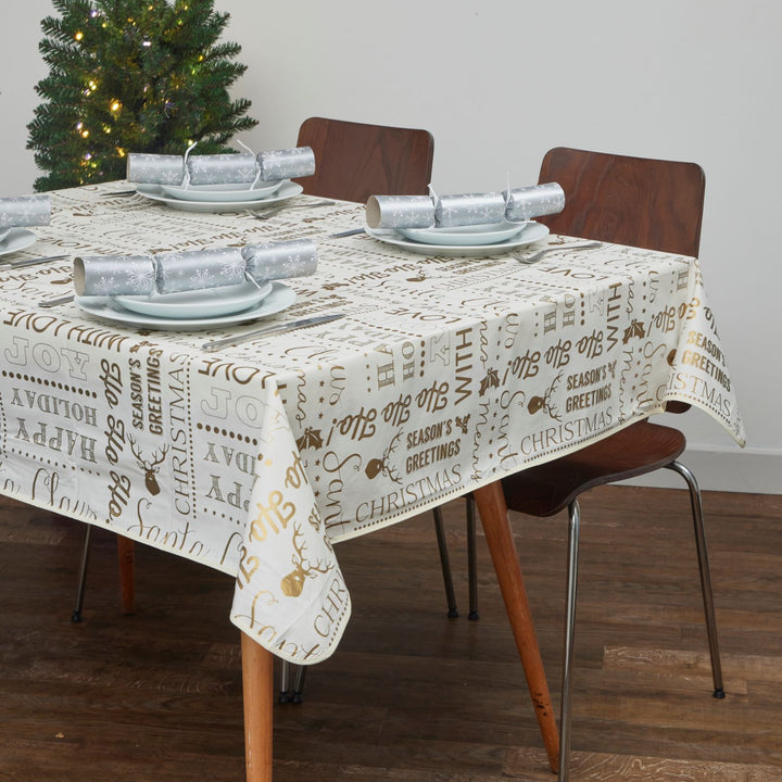 Tablecloth with gold Christmas words, by Celebright.