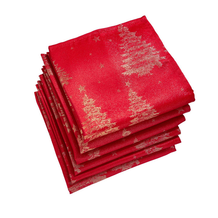 Soft metallic napkins featuring intricate Christmas tree motifs, adding a touch of sophistication to holiday meals