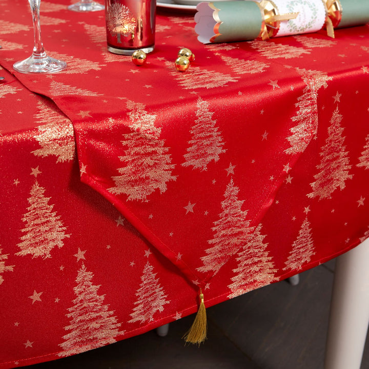 Contemporary silver table runner adorned with Christmas tree silhouettes, bringing a modern touch to festive decor