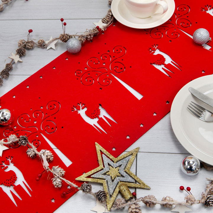 Charm your guests with this Christmas table ensemble featuring Santa Claus and reindeer-themed cutlery holders, elegant table runners, and festive napkin rings, all made from premium felt.