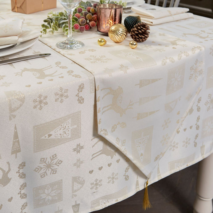 Charming holiday table setting featuring Celebright's Metallic Christmas tablecloth.