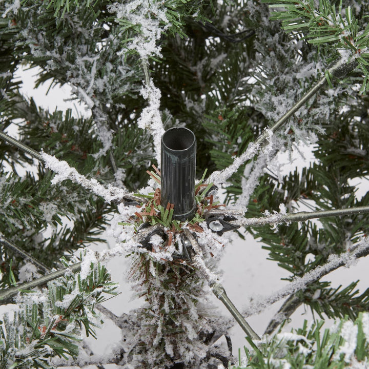 Create cherished moments around our 6ft flocked furry pine Christmas tree, aglow in the soft radiance of warm white lights, perfect for family gatherings.