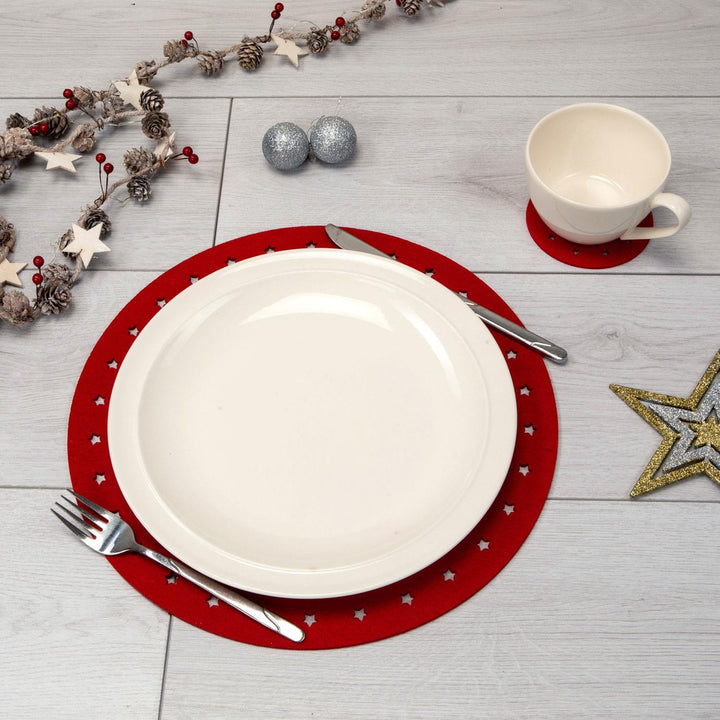 Charming set of Christmas table mats featuring adorable reindeer designs, adding a touch of holiday charm to your dining table setting.