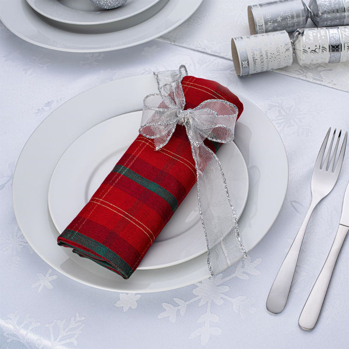 A beautifully set Christmas table featuring Celebright's Metallic Tartan Collection.