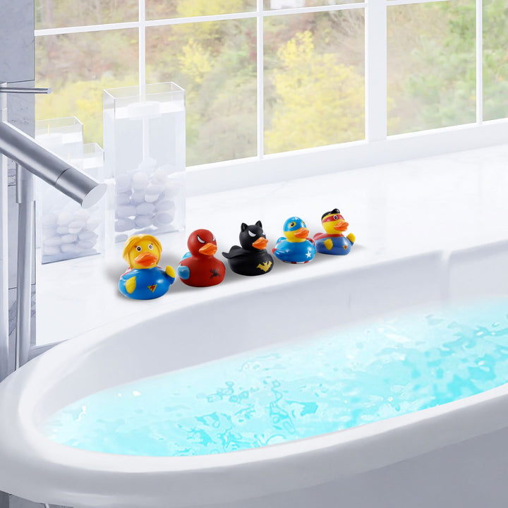 A close-up view of five Quackers superhero rubber ducks, beautifully detailed and standing in a row, ready to make bath time an exciting adventure for your child.