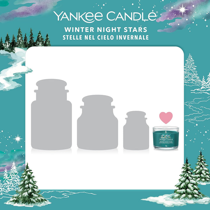 Enhance your winter evenings with this Yankee Candle trio of votives, infused with the soothing aroma of Winter Night Stars and featuring a beautiful starlit design.