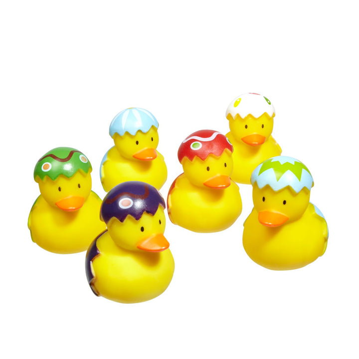 A set of six Easter egg-themed rubber ducks, perfect for bath time fun.