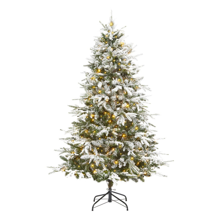 A 6ft flocked furry pine Christmas tree adorned with warm white lights, creating a cozy holiday ambiance.