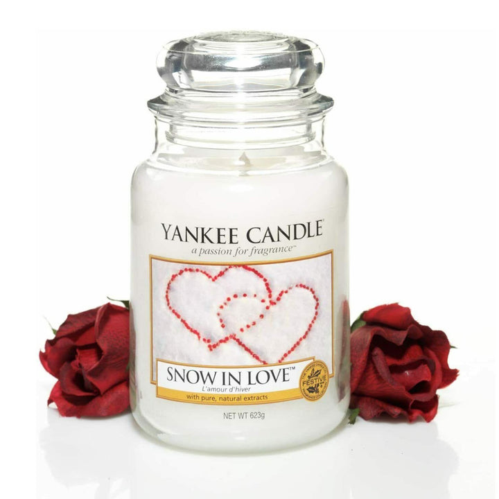 Holiday joy encapsulated in Snow In Love by Yankee Candle.