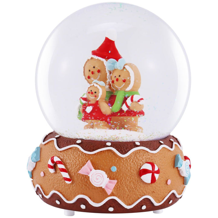 A magical Christmas Musical Snowglobe featuring a heartwarming Gingerbread Family. Vibrant colors and intricate details create a festive holiday scene.