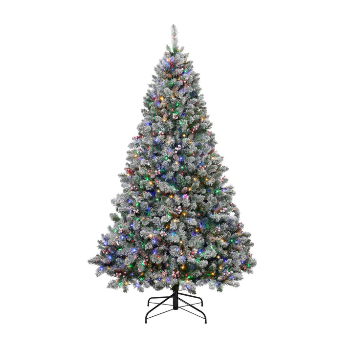 A 7ft snowy Windsor Christmas tree sparkling with 900 warm white micro LED lights, radiating enchantment and holiday joy.