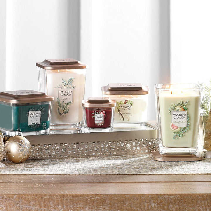A mesmerizing image inviting you to experience the enchanting scents of Yankee Candle Elevation.