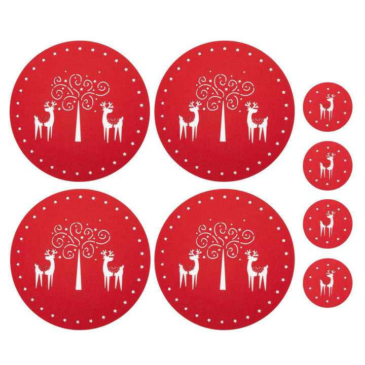 8-piece Christmas dinner table set featuring 4 large round plate mats and 4 matching coasters, all adorned with a cut-out design of reindeers under a snowy tree and starry night.