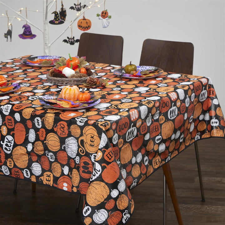 Colorful PVC tablecloths featuring a mix of playful and freaky Halloween characters like monsters, mummies, and witches, adding fun to your spooky celebration.