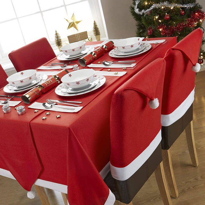 Festive table setting with Celebright Christmas Santa's Tablecloth & Chair Covers.
