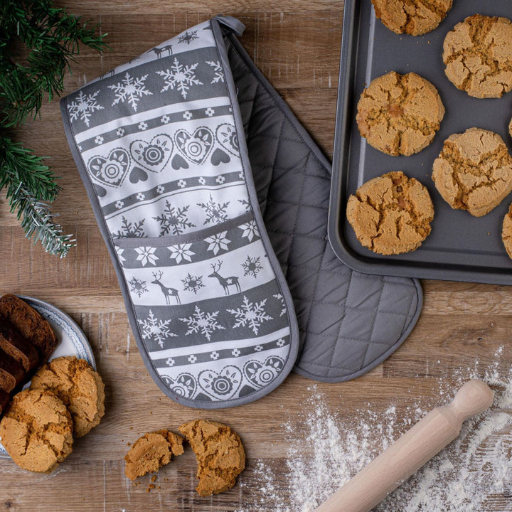 Festive holiday-themed oven gloves as part of the Celebright Christmas Kitchen Range.