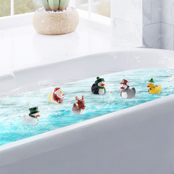 A delightful scene showcasing a pack of 6 Quackers Christmas rubber ducks, each adorned with holiday-themed accessories, floating in a bath filled with seasonal cheer.