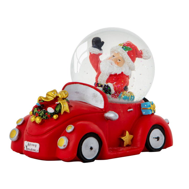 A festive Santa Claus figurine driving a car inside a musical snow globe, adding holiday charm to your decor.