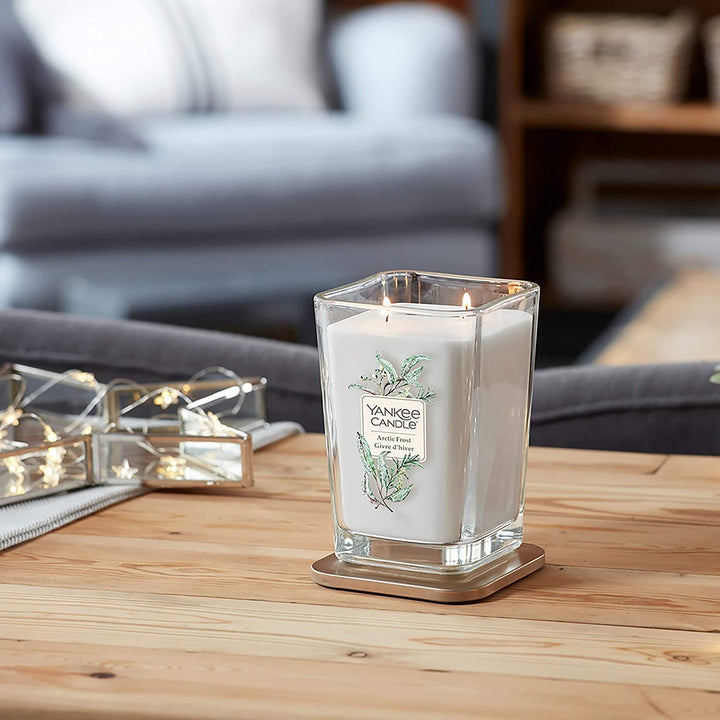 A serene image highlighting the use of Yankee Candle Elevation scented candles for relaxation and renewal.