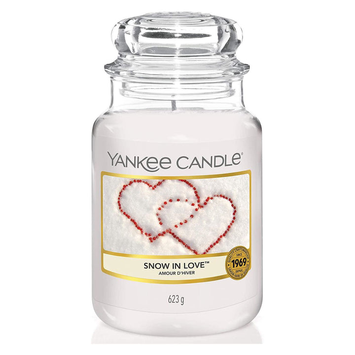 A large jar candle in Yankee Candle's Snow In Love scent.