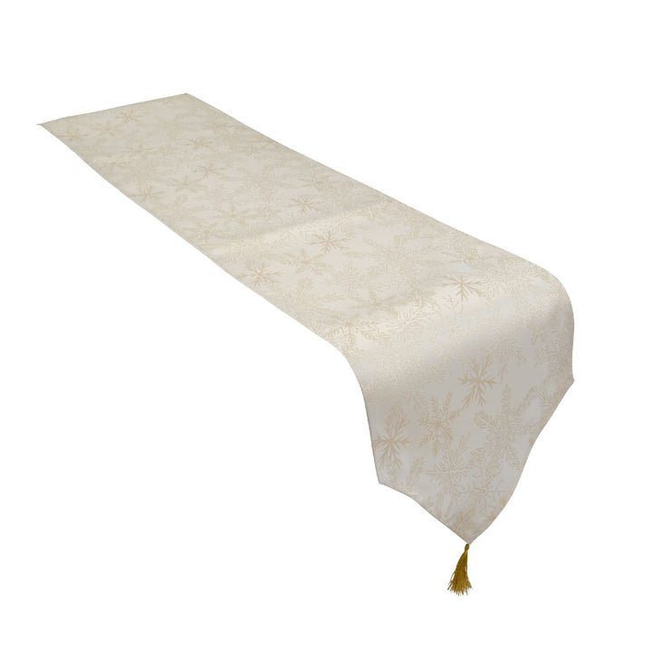 Cream and gold snowflake table runner, sized 13x72 inches, adding a touch of delicacy.