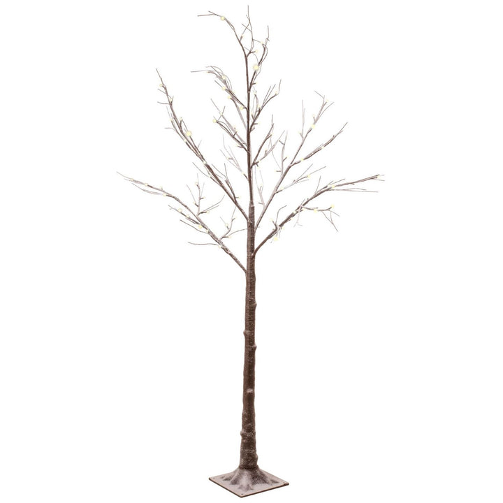 A 6ft Snowy Brown Twig Tree with Warm White Lights, beautifully adorned with snow, creating a warm and inviting winter ambiance.
