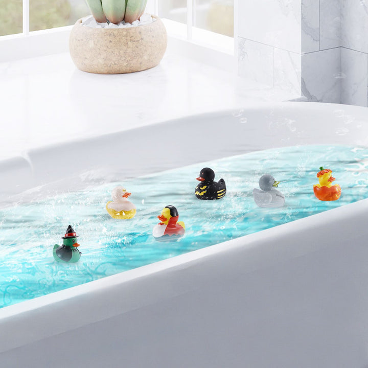 Rubber ducks floating in a bathtub, adding a spooky touch to bath time.