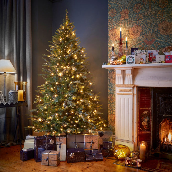 Front view of the 7ft Tiffany Christmas Tree with 300 vintage white LEDs, showcasing its elegant design and lifelike foliage.