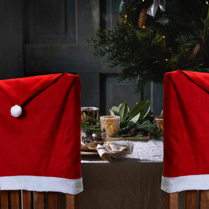 Every stitch of Santa's Tablecloth & Chair Covers is infused with holiday cheer.