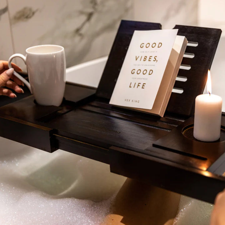 The versatile Arashiyama Bamboo Bath Tray being used as a breakfast tray, adorned with a delicious morning spread, illustrating its functionality and style for lazy weekend mornings.