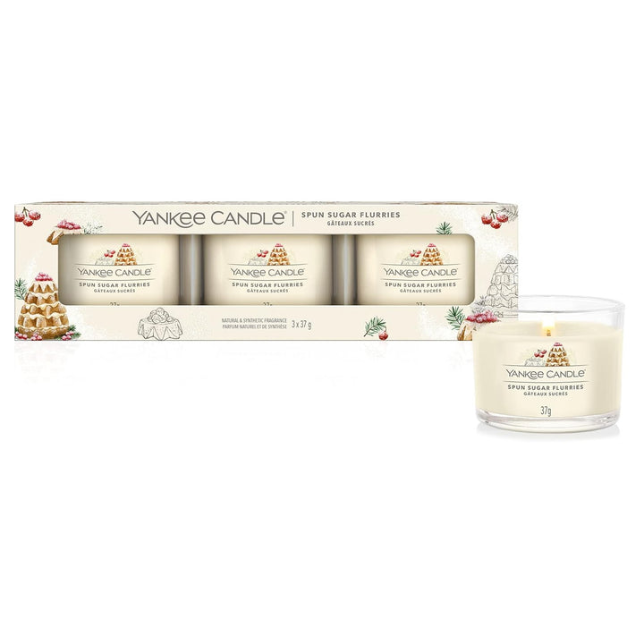 Three Yankee Candle votive candles in a pack, featuring the delightful scent of Sugar Spun Flurries.