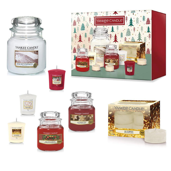 A festive Yankee Candle gift set with 12 Christmas-scented jar candles, votives, and tea lights.