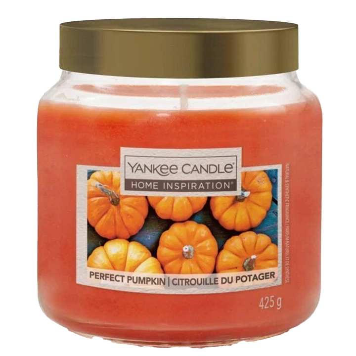Experience the warm, inviting scent of Perfect Pumpkin in a medium jar with a stylish metal lid from Yankee Candle Home Inspiration.