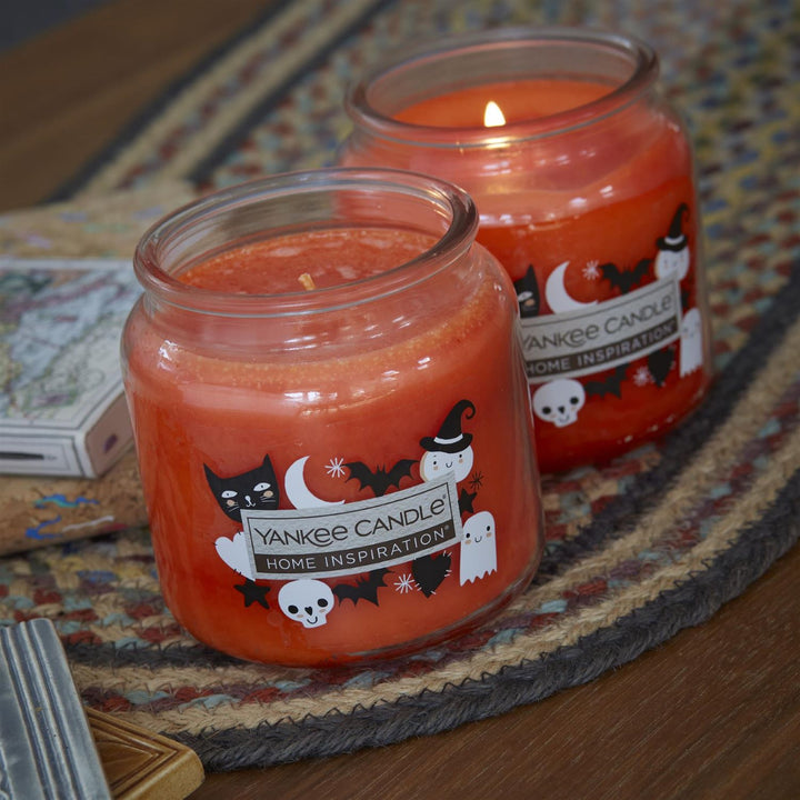 Medium-sized Yankee Candle Perfect Pumpkin jar, a fall essential.