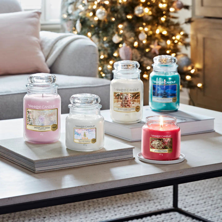 Transform your home into a winter haven with the soothing fragrance of Snowflake Kisses, encapsulated in our large jar candle, promising an extended burn time of 150 hours.