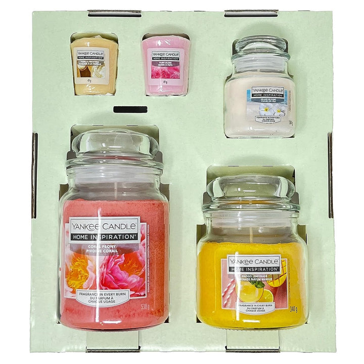 Experience the essence of spring and summer with our thoughtfully curated gift set featuring Coral Peony, Mango Lemonade, Island Blooms, Vanilla Frosting, and Fairy Floss candles.